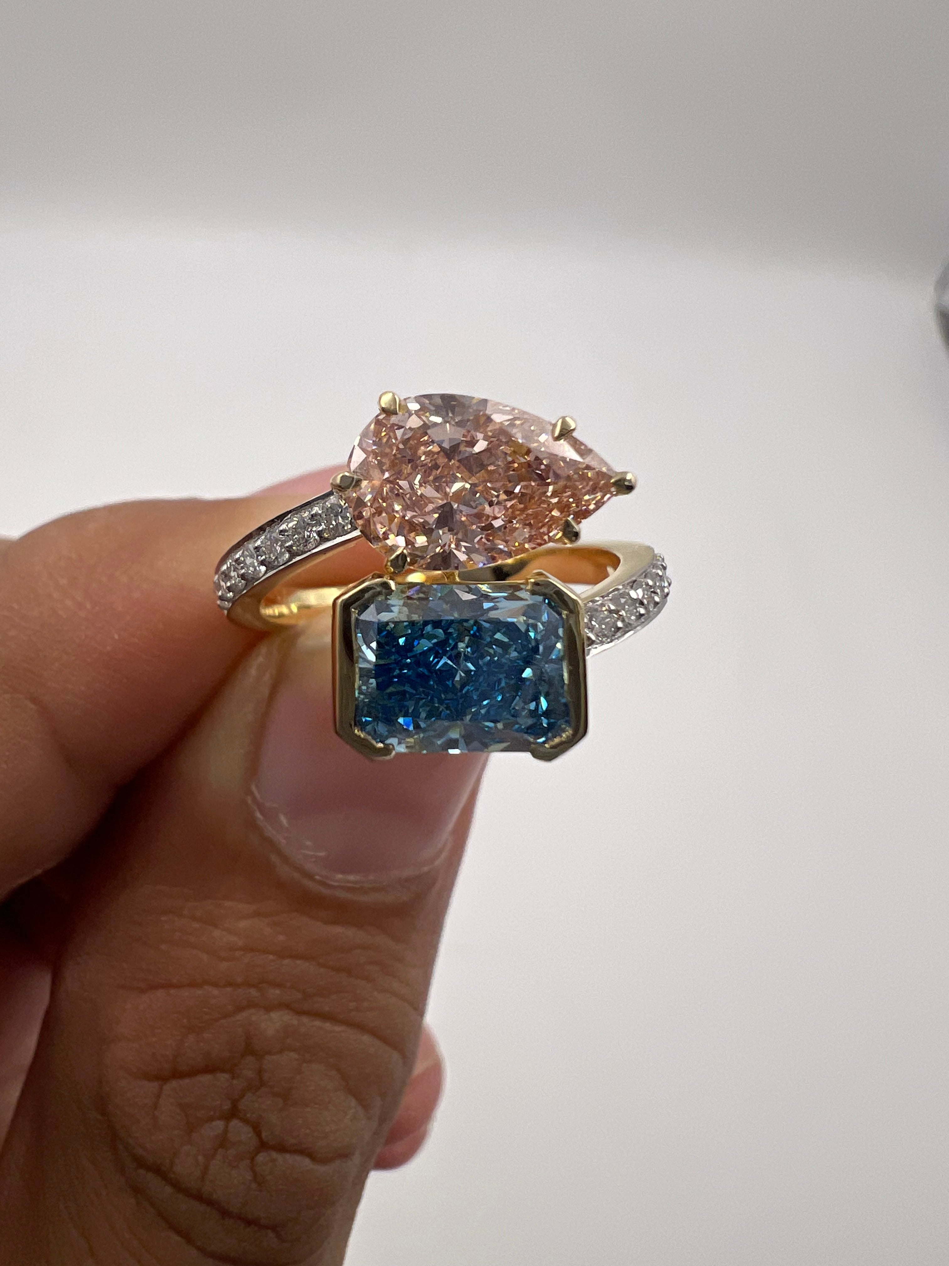 4.50ct Fancy Vivid Pink Pear and Fancy Vivid Blue Radiant Toi et Moi Ring