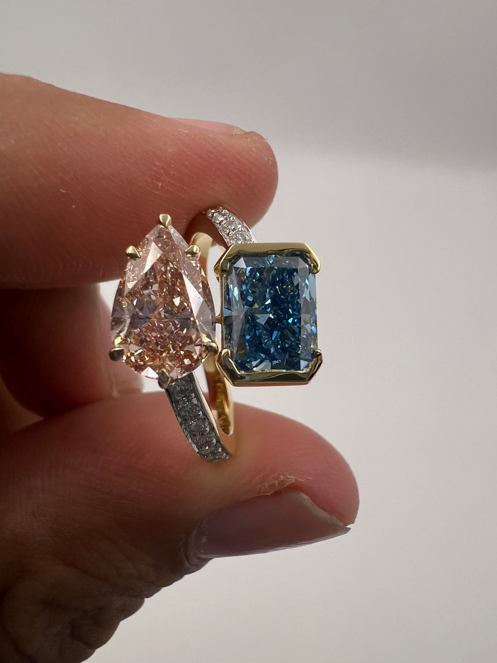 4.50ct Fancy Vivid Pink Pear and Fancy Vivid Blue Radiant Toi et Moi Ring