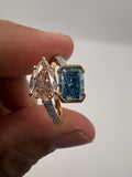 4.50ct Fancy Vivid Pink Pear and Fancy Vivid Blue Radiant Toi et Moi Ring