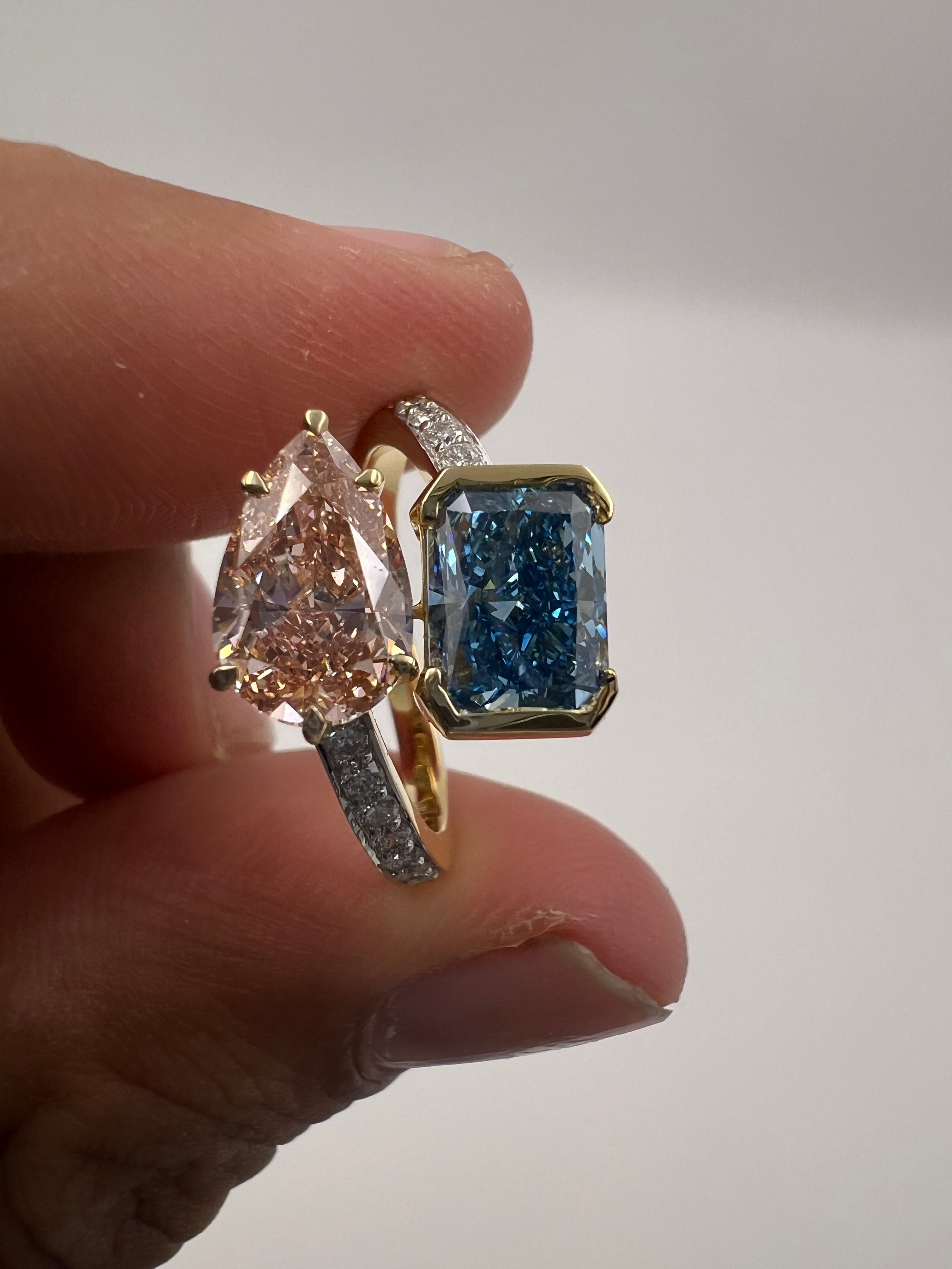 4.50ct Fancy Vivid Pink Pear and Fancy Vivid Blue Radiant Toi et Moi Ring