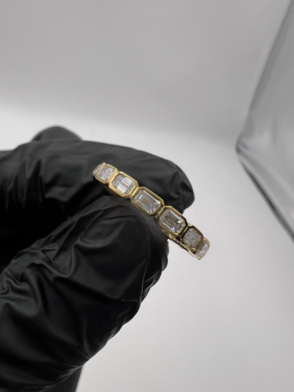 1.00ct Emerald East West Bezel Set 3/4 Eternity Band