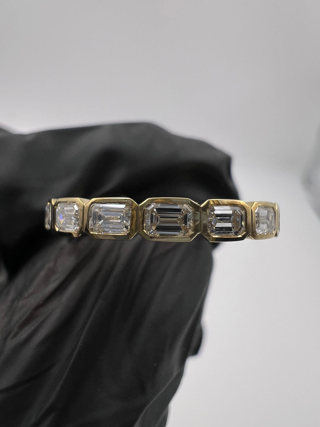 1.00ct Emerald East West Bezel Set 3/4 Eternity Band