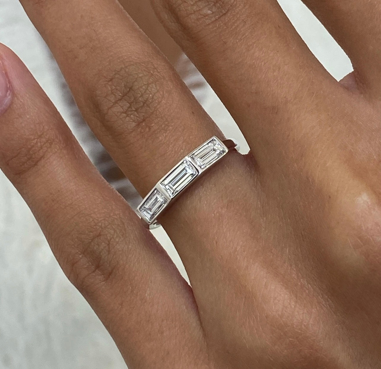 0.68ct Three Tapered Baguette Bezel Set Wedding Ring