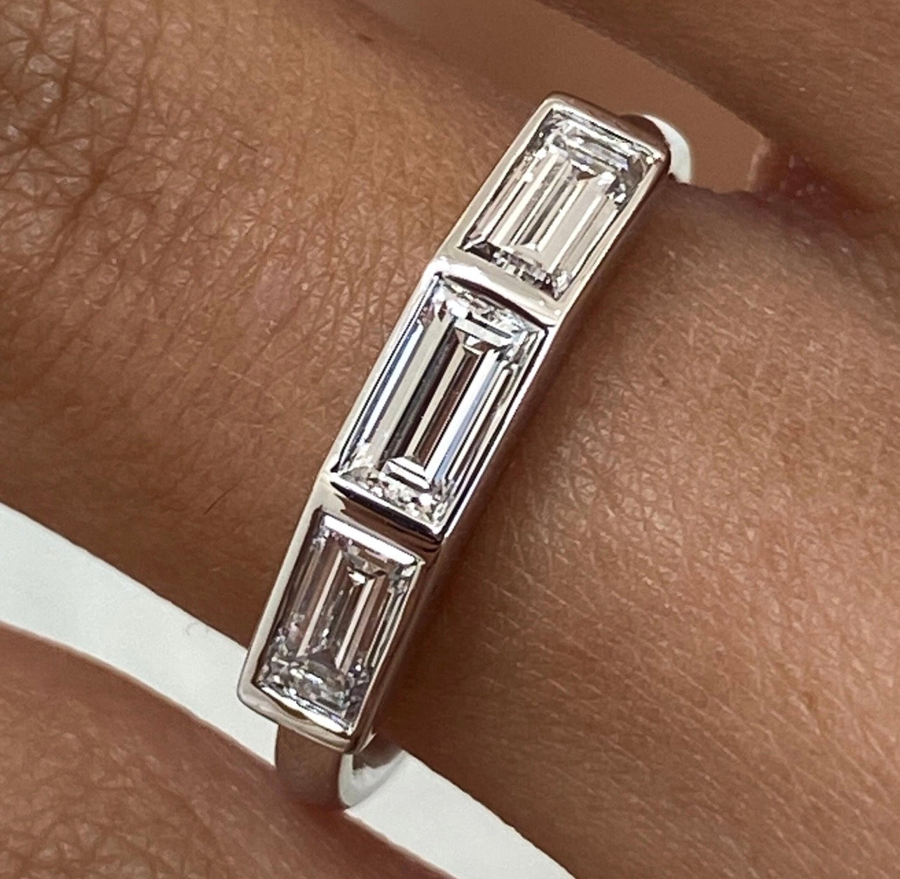 0.68ct Three Tapered Baguette Bezel Set Wedding Ring