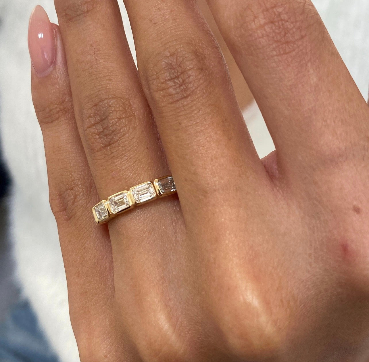 1.25ct Emerald East-West Bezel Set Ring