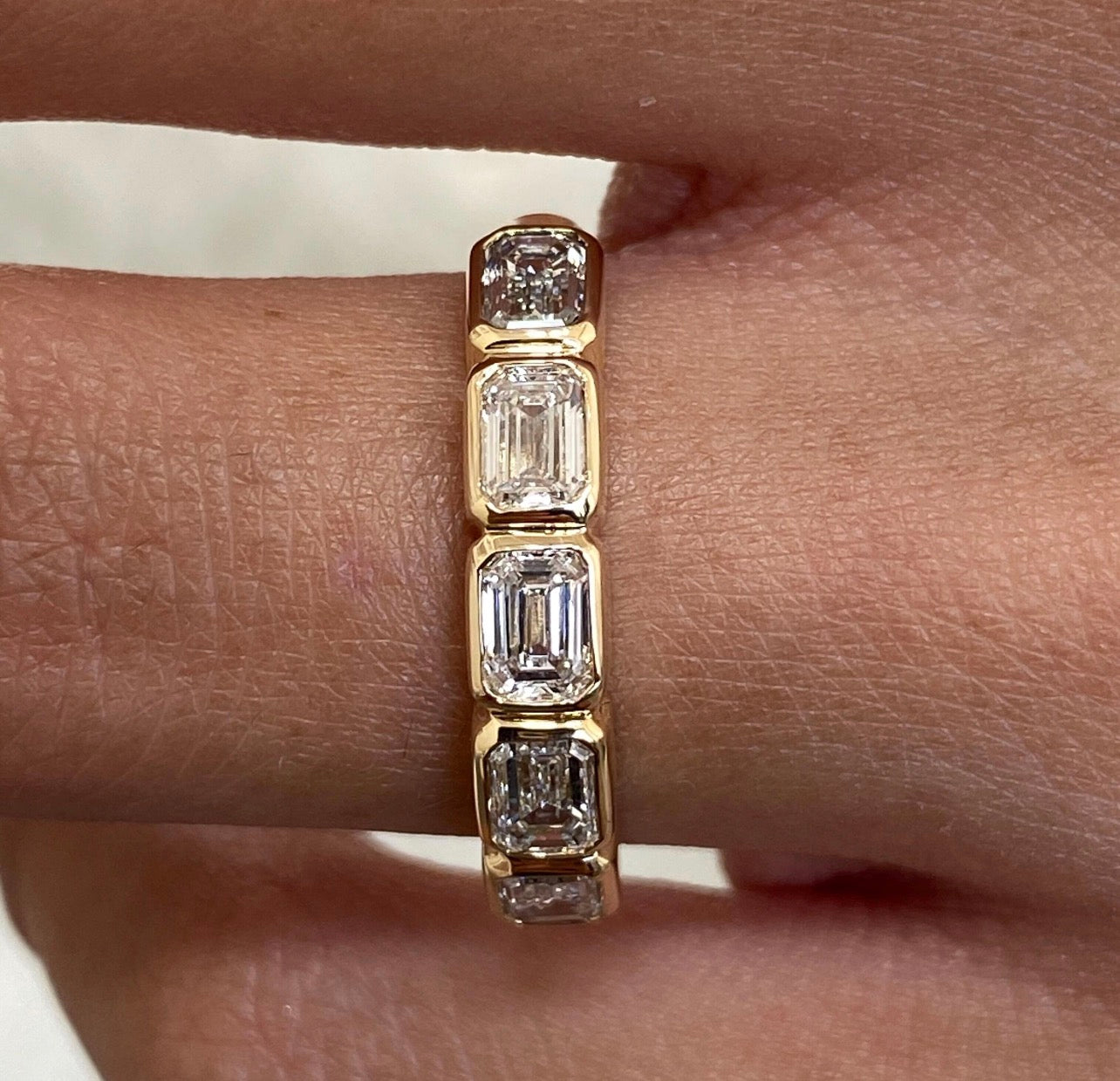 1.25ct Emerald East-West Bezel Set Ring