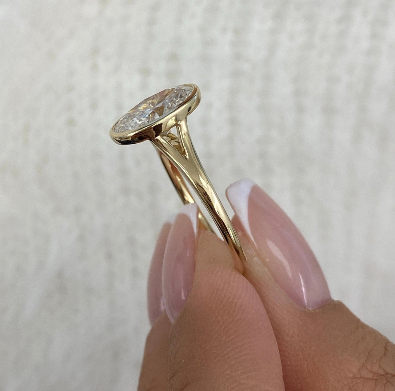 Oval Cut Bezel Set Proposal Ring